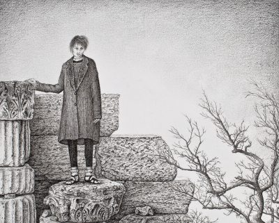 woman standing on ancient stones with a tree101a